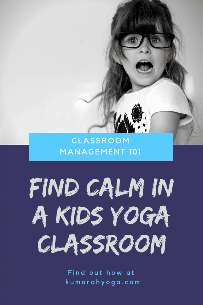 Classroom management 101, find calm in a kids yoga classroom, find out how at kumarahyoga.com, a young student looks surprised with her mouth open wide and big eyes