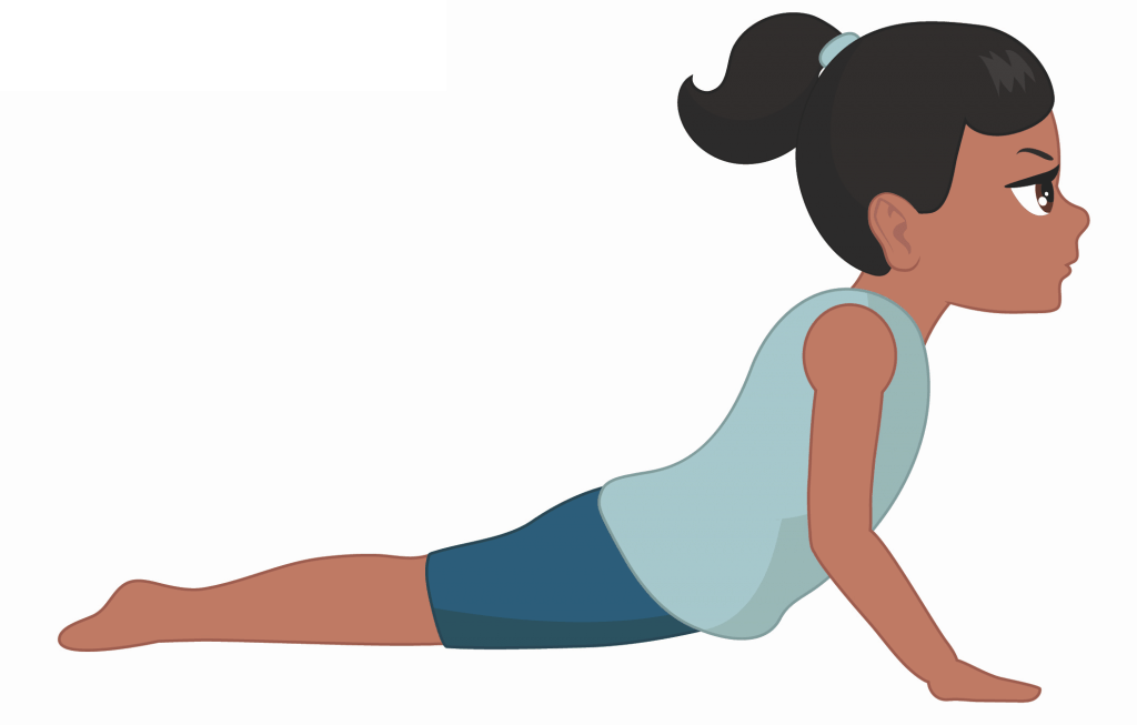 girl is practicing cobra pose for kids, laying on her tummy with legs straight behind her and arms pressing into the floor to lift her torso and look forward