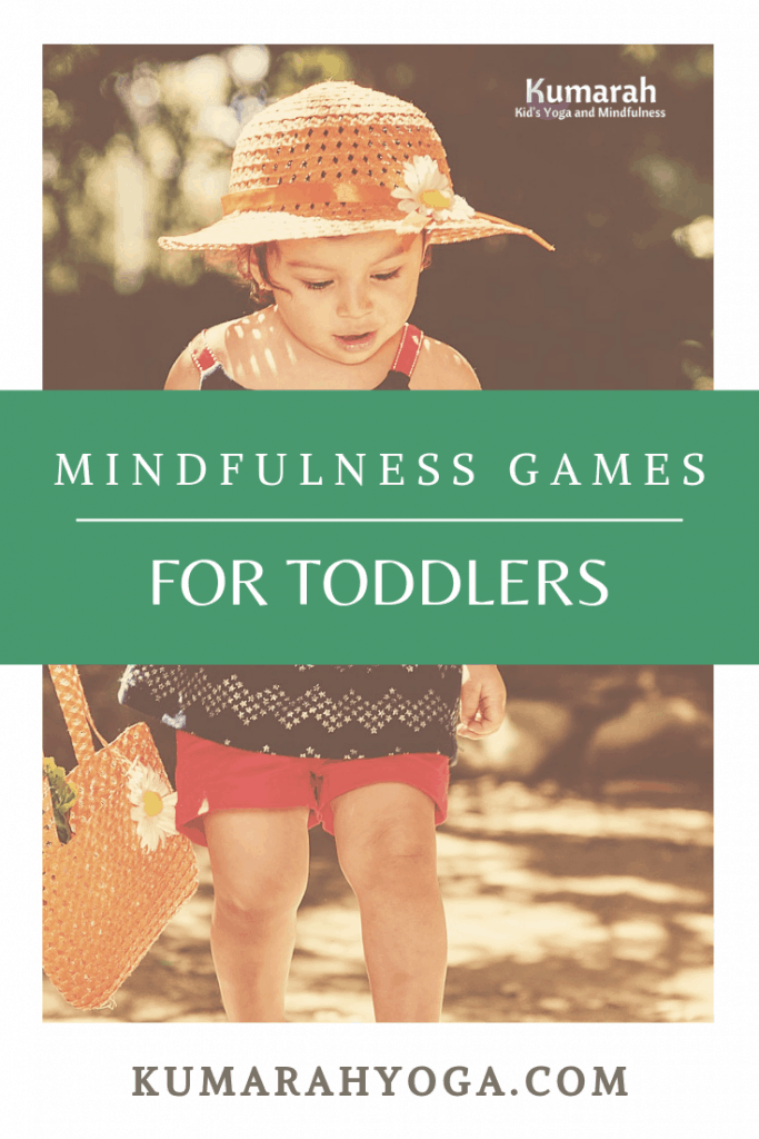 toddler playing outside looking for details in nature to play a mindfulness game
