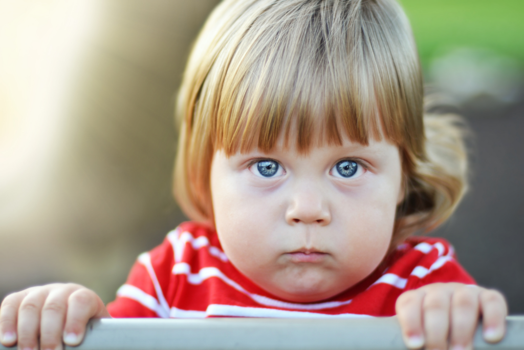 playing a staring content to teach toddler mindfulness