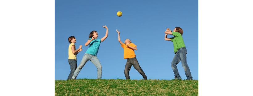 kids playing group games with a ball