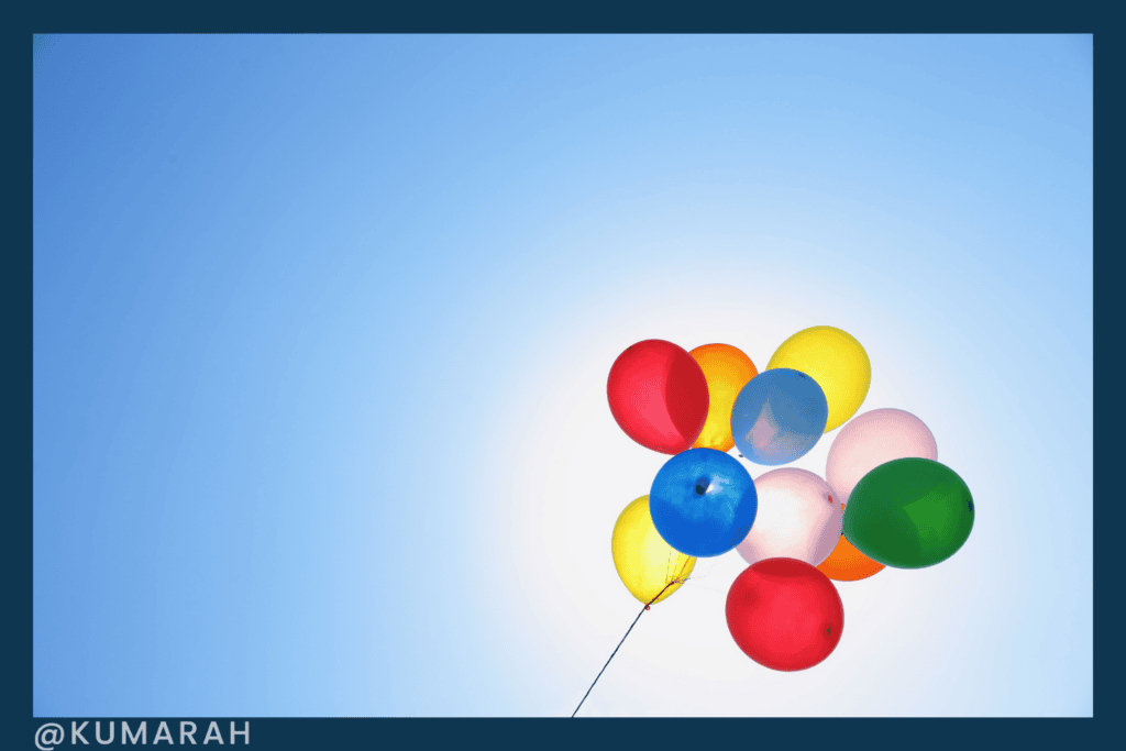 balloons floating in the sky