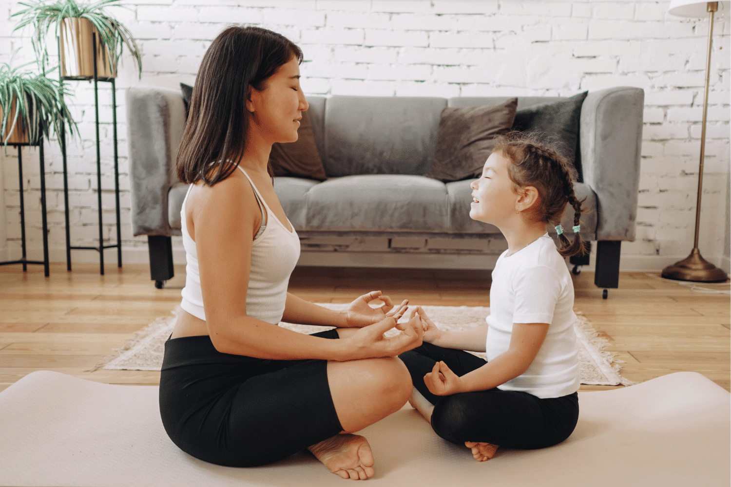 parent and child breathing and practicing mindfulness