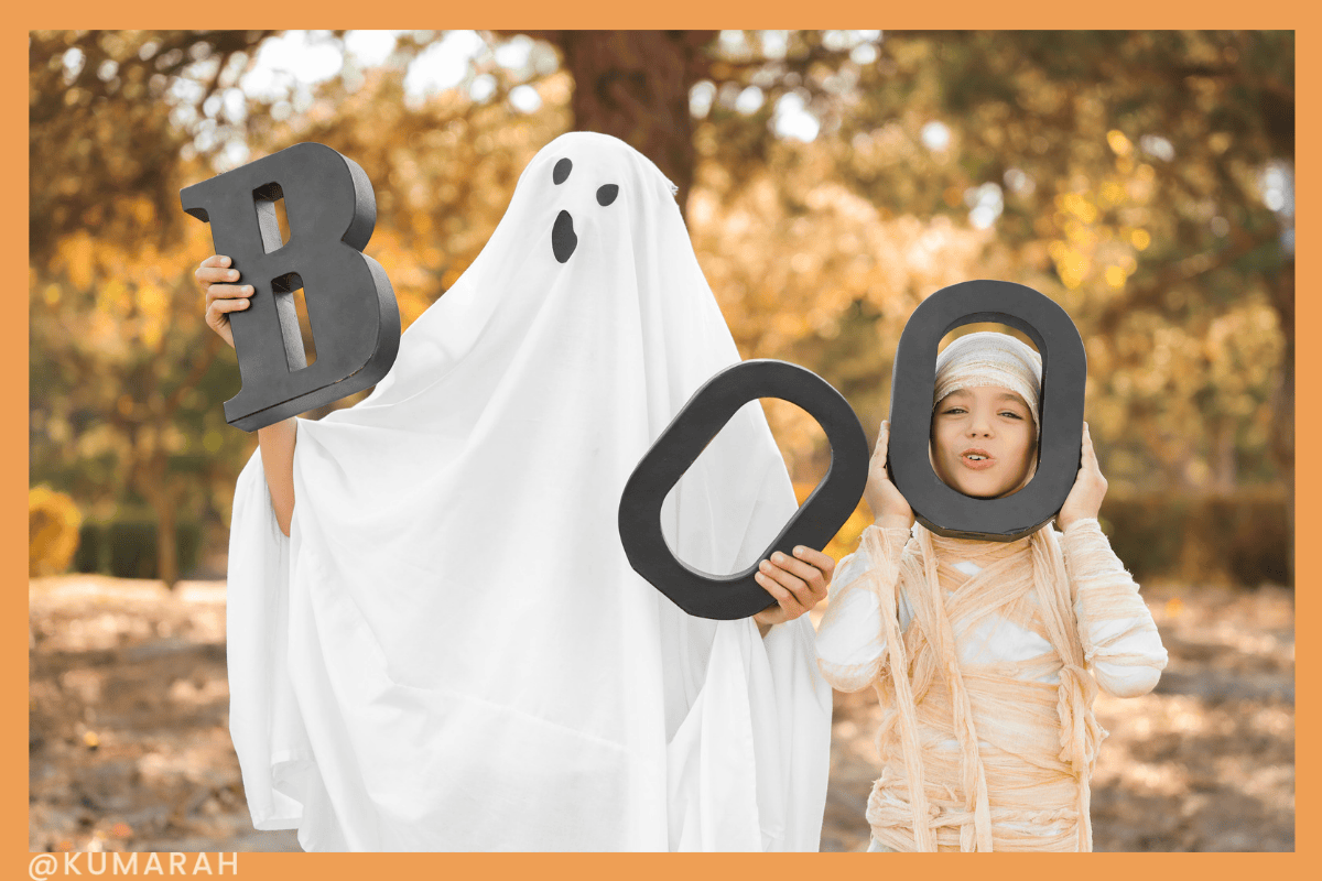 kids dressed for halloween as a ghost and a mummy